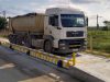 O problemă cunoscută, ignorată ani la rând: camioanele supraîncărcate și statul care se face că nu vede cine „rupe” drumurile!